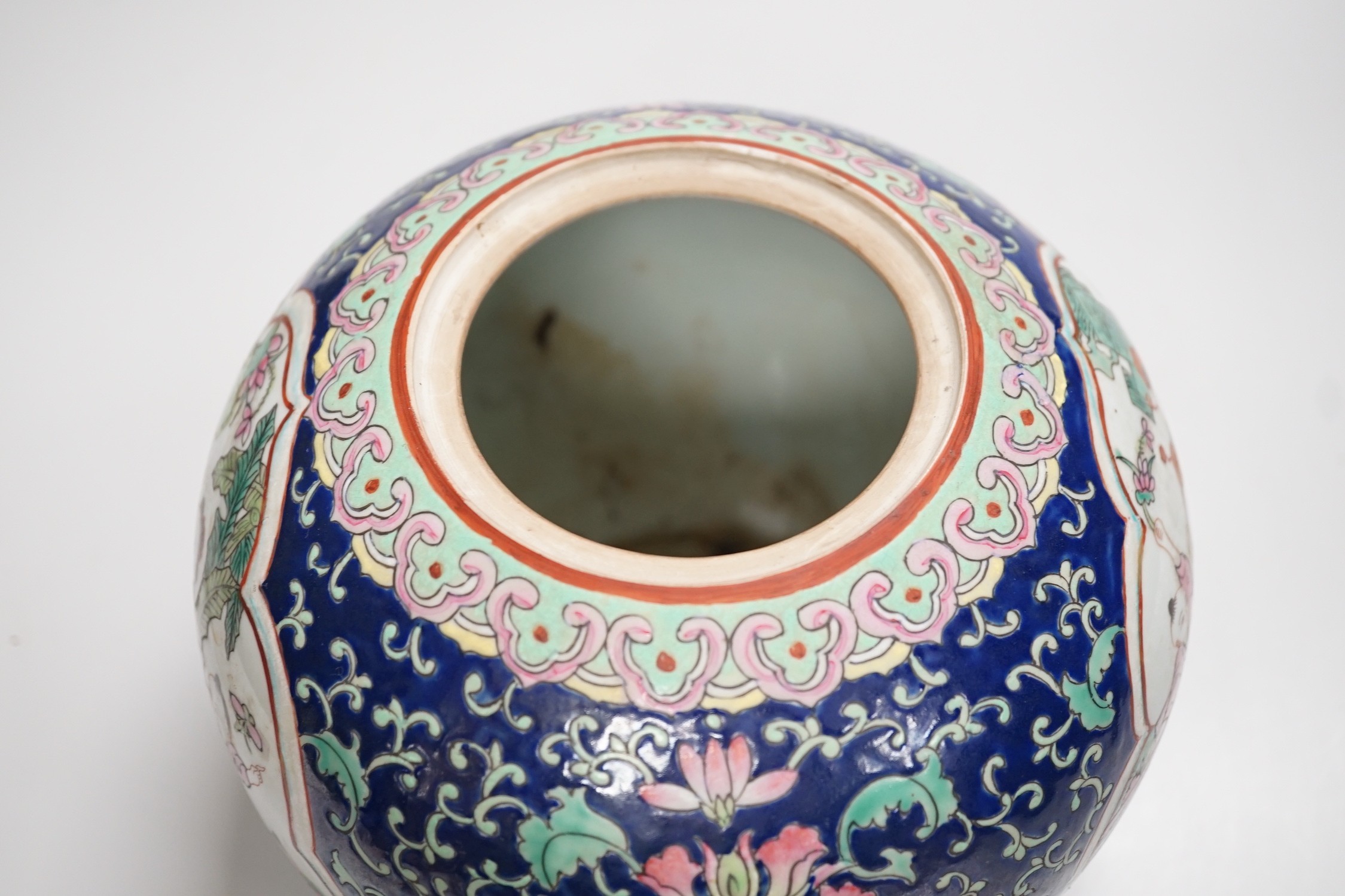 A Chinese famille rose jar and cover, 20cm high